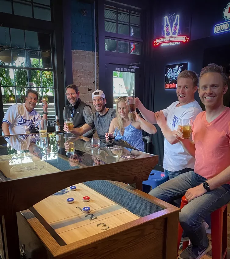 varsity-construction-waldo-social-kc-shuffleboard-glass-table-beer-cheers