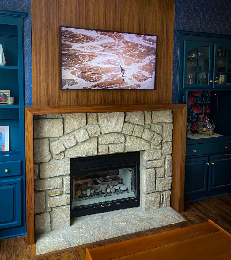 varsity-construction-media-mantle-fireplace-blue-cabinets